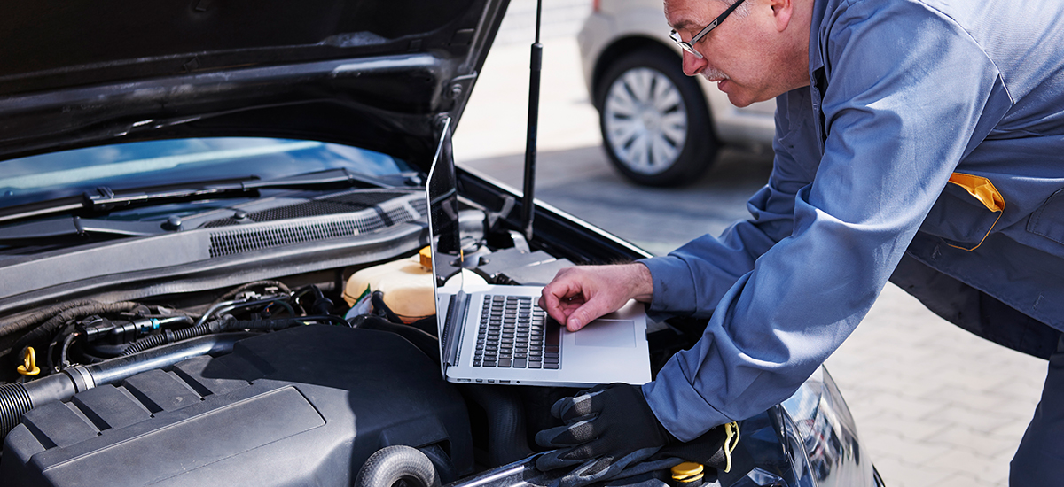 technician checking diagnostic trouble codes