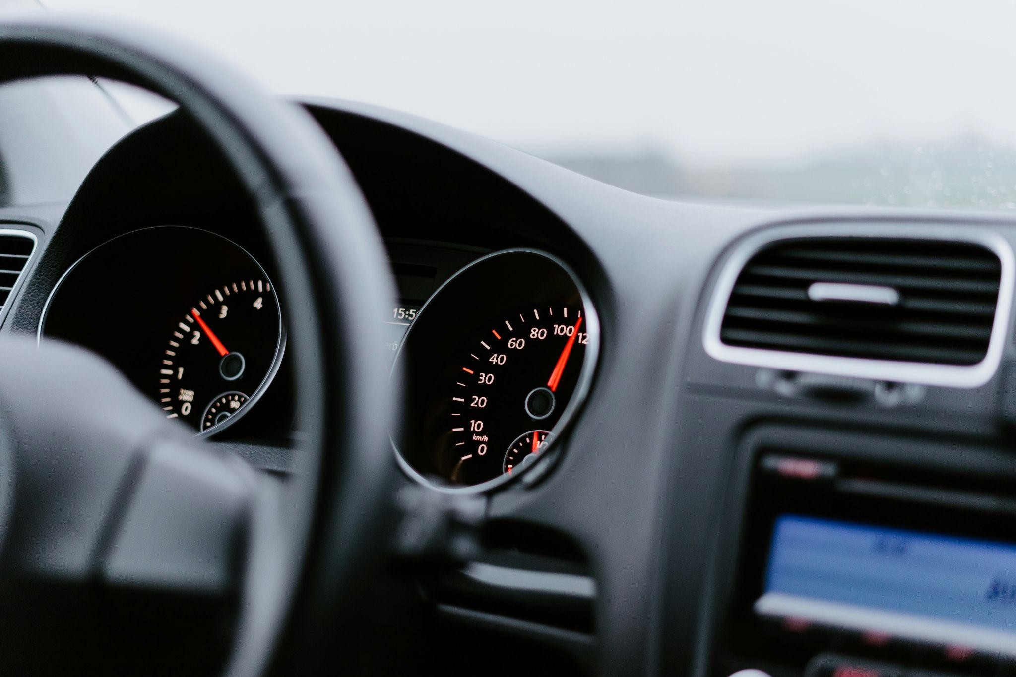 A close up image of a car's dashboard